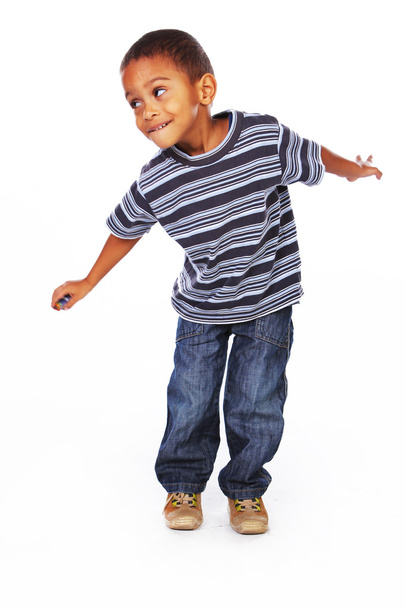 Niño negro en jeans y camisa
 - Foto, Imagen