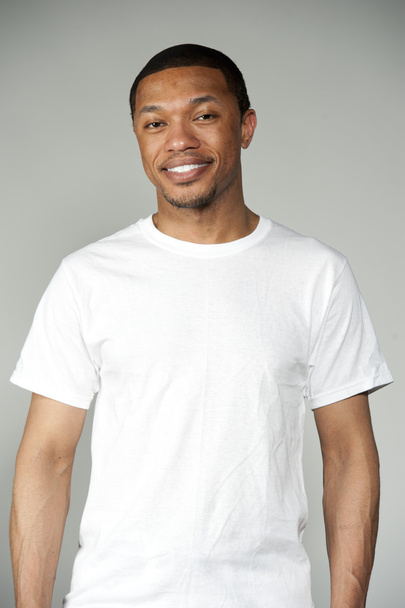 Trendy Happy and Fun Black Male Wearing A White Top - Фото, изображение
