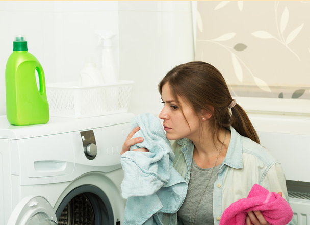 Beautiful girl doing laundry - Photo, Image