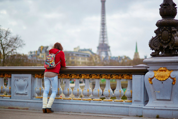 Young tourist in Paris on the Pont Alexandre III - Фото, изображение