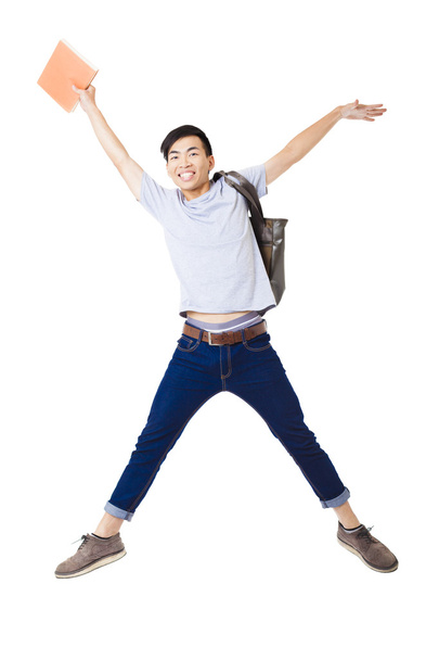 young happy man student jumping  - Fotó, kép