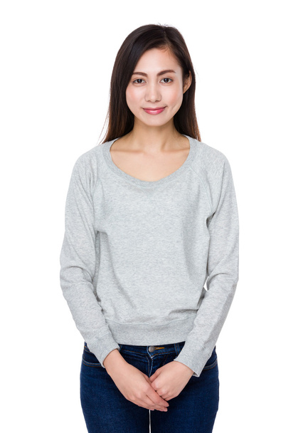 Young asian woman in grey sweater - Zdjęcie, obraz