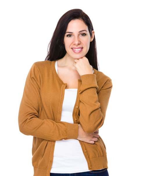 Young brunette woman in brown jacket - Фото, изображение