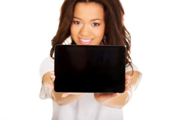 Woman showing tablet computer. - Foto, imagen