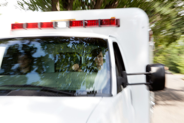 Paramedics in Speeding Ambulance - Foto, Imagem