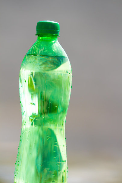 clean water in green bottle, close up - Photo, Image