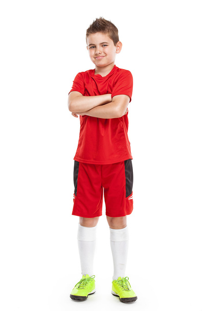スポーツウェアの立っている若いサッカー選手 - 写真・画像