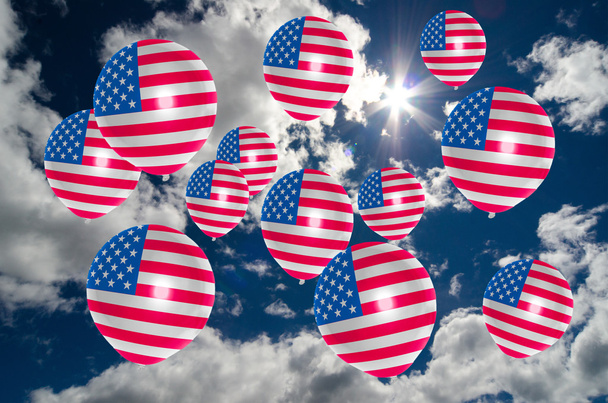 molti palloncini con bandiera USA sul cielo
 - Foto, immagini