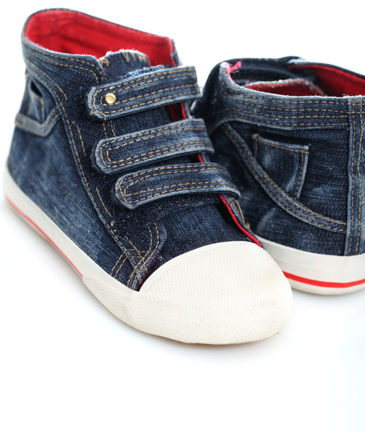Два джинси спортивне взуття дитини
 - Фото, зображення