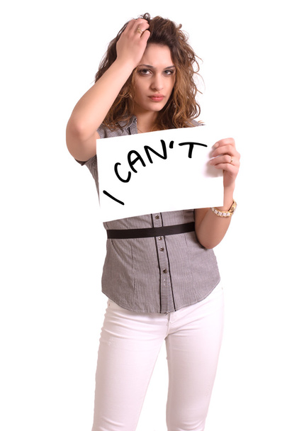 uncomfortable woman holding paper with I can't text - Photo, Image