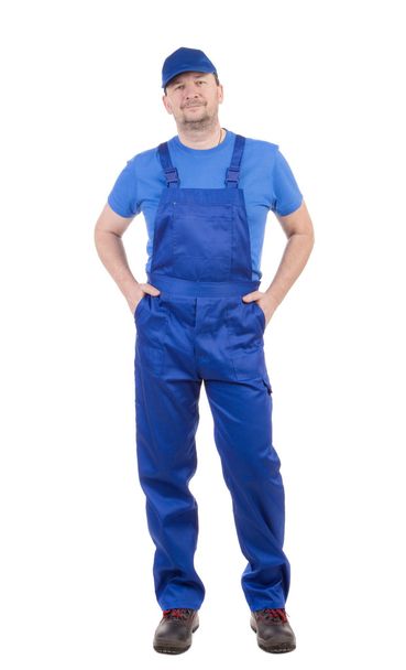 Worker in blue overalls - Fotoğraf, Görsel