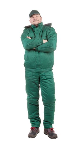 Worker in green overalls.  - Φωτογραφία, εικόνα