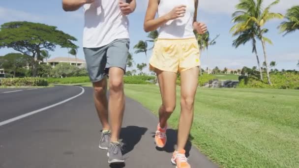 pareja haciendo ejercicio trotar afuera
 - Imágenes, Vídeo