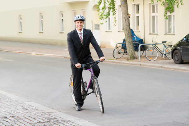Happy Businessman Riding - Photo, image