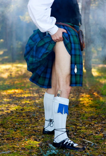 Beine des Mannes im Kilt - Foto, Bild
