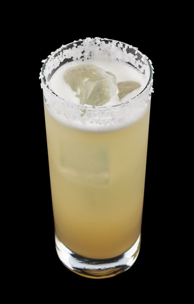 Salty Dog is a drink that contains gin or vodka and grapefruit juice in a salt-rimmed glass - Photo, Image