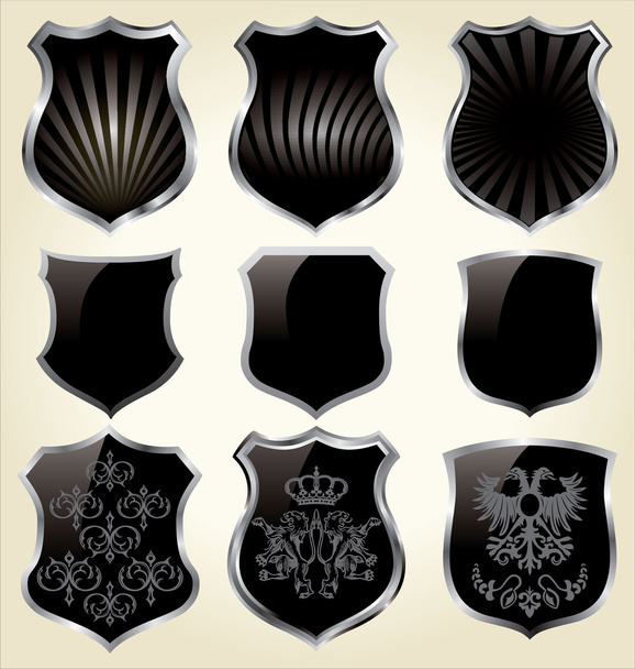 Set of black steel shields - isolated - Foto, Bild