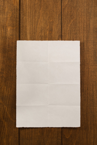 paper on wooden background - Фото, зображення