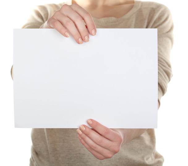 Woman holding blank card close up - Photo, image