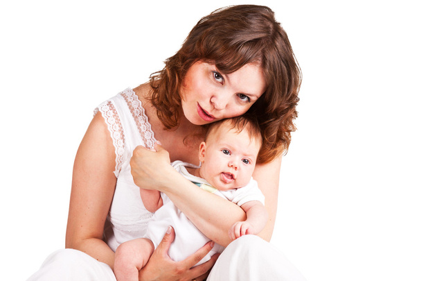 μητέρα που κρατάει το αξιολάτρευτο μωρό - Φωτογραφία, εικόνα