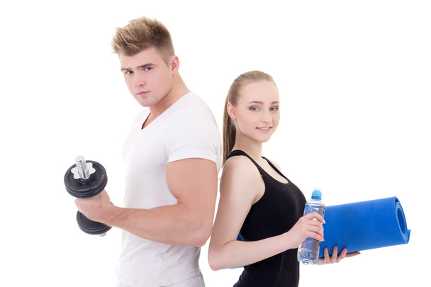 portrait of man and woman in sportswear with dumbbells and yoga  - Photo, image