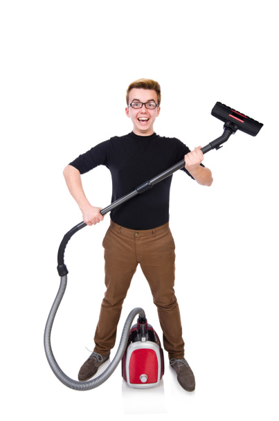 Funny man with vacuum cleaner on white - Photo, Image