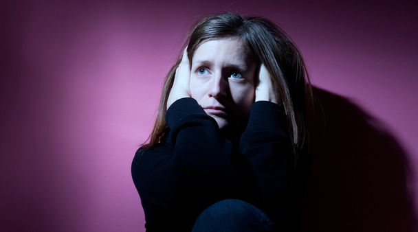 Young woman suffering from severe depression - Valokuva, kuva