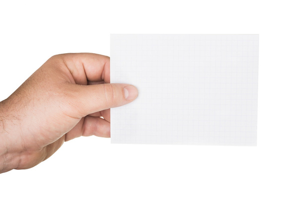 man 's hand holding a paper sheet
 - Фото, изображение