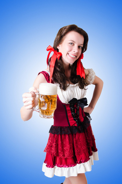 Bavarian girl with tray - Фото, изображение