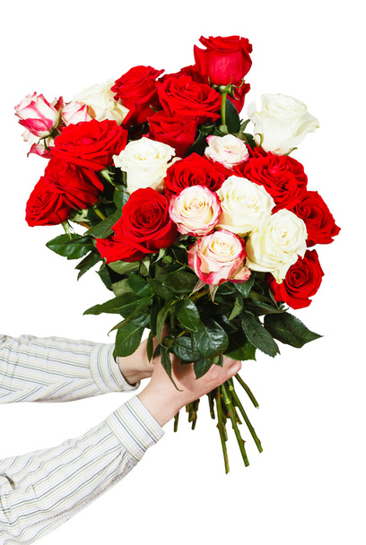 two hands giving bouquet of many roses isolated - Photo, Image