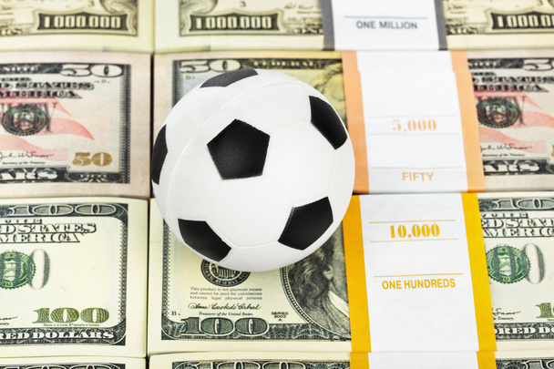 Money and soccer ball - Foto, afbeelding