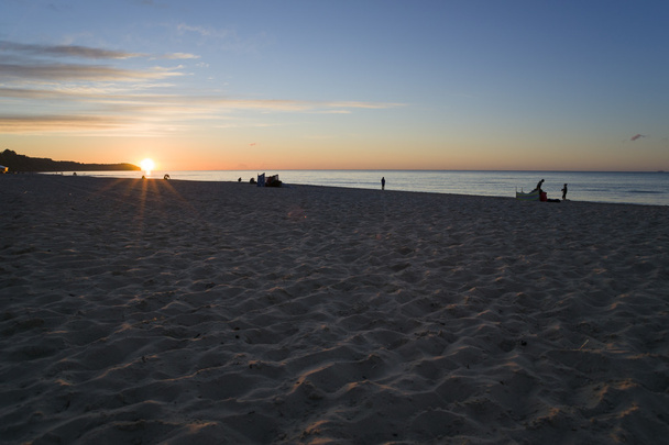 Pôr do sol no mar
 - Foto, Imagem