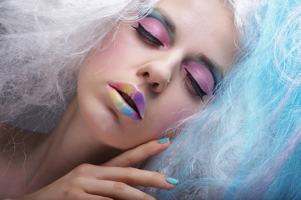 young woman with bright make up and creative hair - Foto, Bild