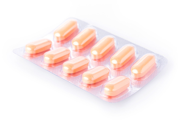 pílulas de médicos isolados em fundo branco
 - Foto, Imagem