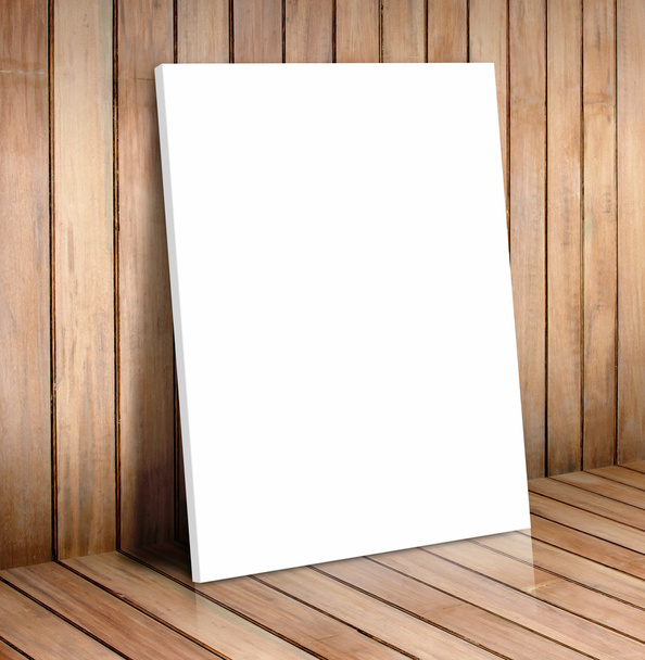 White poster frame in wooden room - Foto, Bild