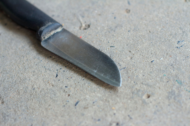 A kitchen knife on a gray background. - Foto, Imagem