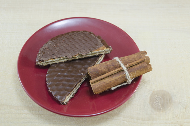 Chocolate biscuits with cinnamon sticks - Photo, Image