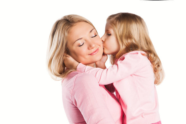 Portrait of happy embracing mother and daughter - Fotografie, Obrázek