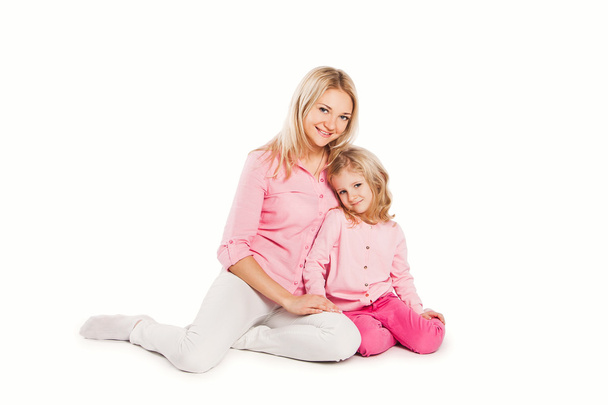 Portrait of happy embracing mother and daughter - Fotografie, Obrázek