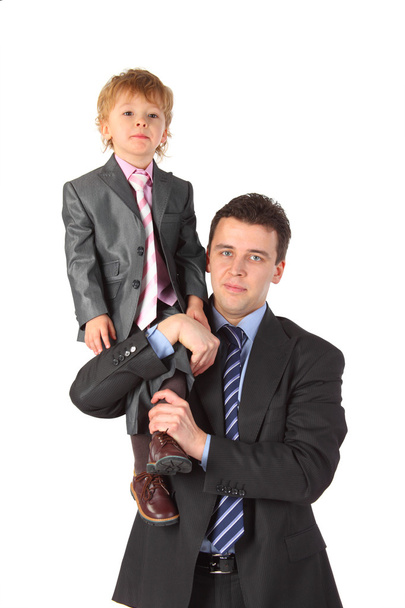 Businessman hold boy on shoulder - Foto, imagen