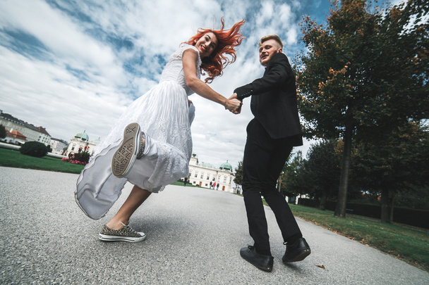 Wedding couple on a walk - Foto, Imagen
