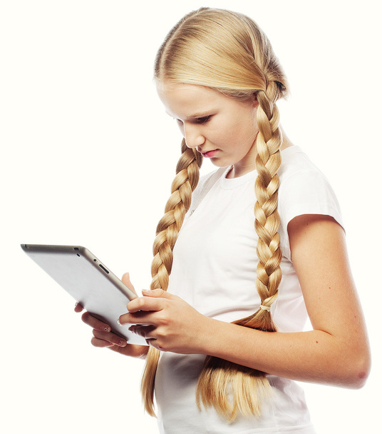 Pretty little girl with a Tablet PC  - Photo, Image