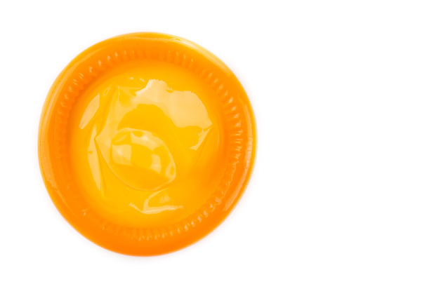 Oranssi kondomi
 - Valokuva, kuva