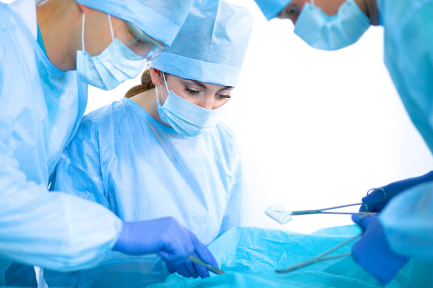 Surgery team in the operating room - Fotó, kép