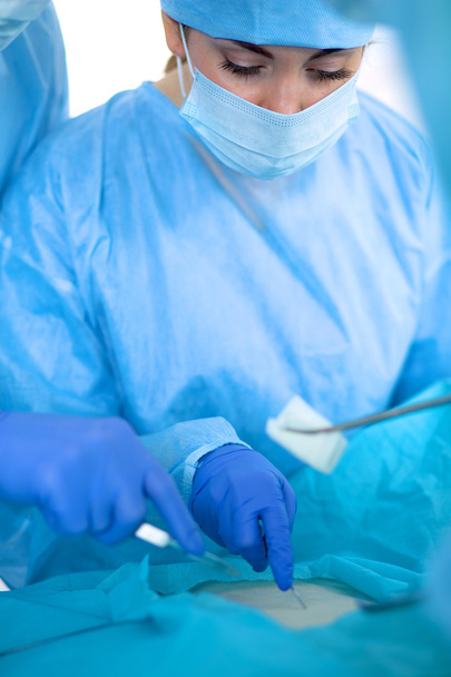 Surgery team in the operating room - 写真・画像