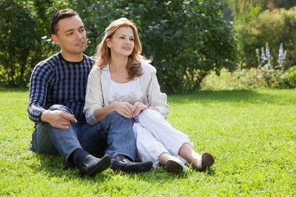 Married couple looking aside outdoors - Foto, Imagem