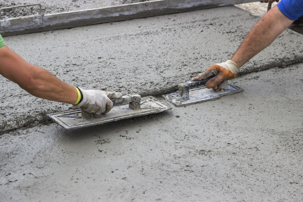 Leveling concrete with trowels - Photo, Image