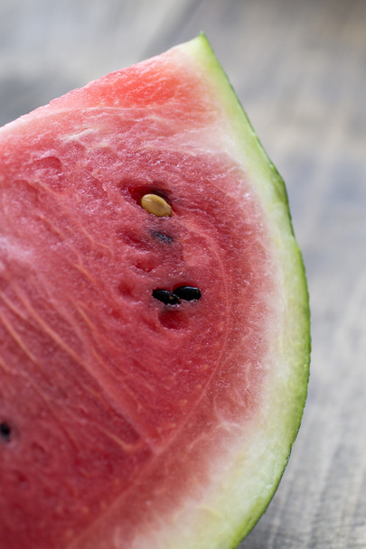 Slice of watermelon on wooden table - Photo, image