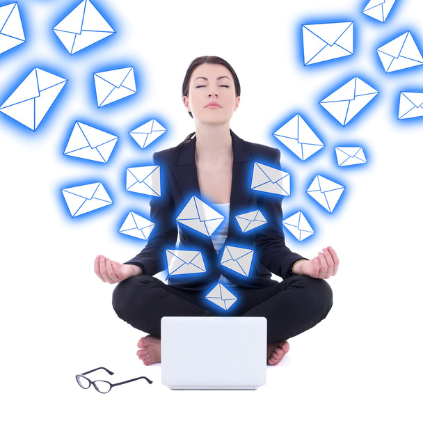 spam concept - young businesswoman sitting in yoga pose with lap - Photo, Image