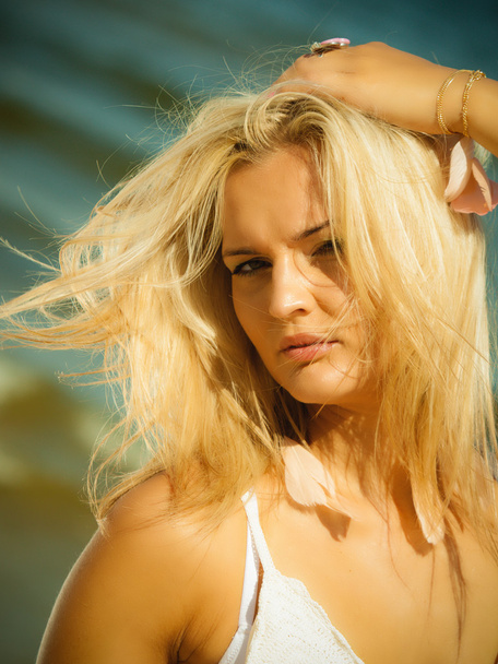 Portrait of blonde girl on beach - Fotoğraf, Görsel